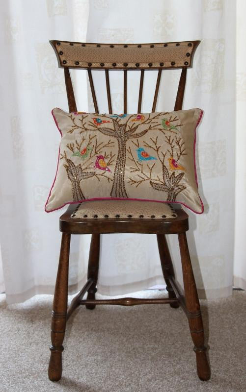 Sequin birds in tree cushion