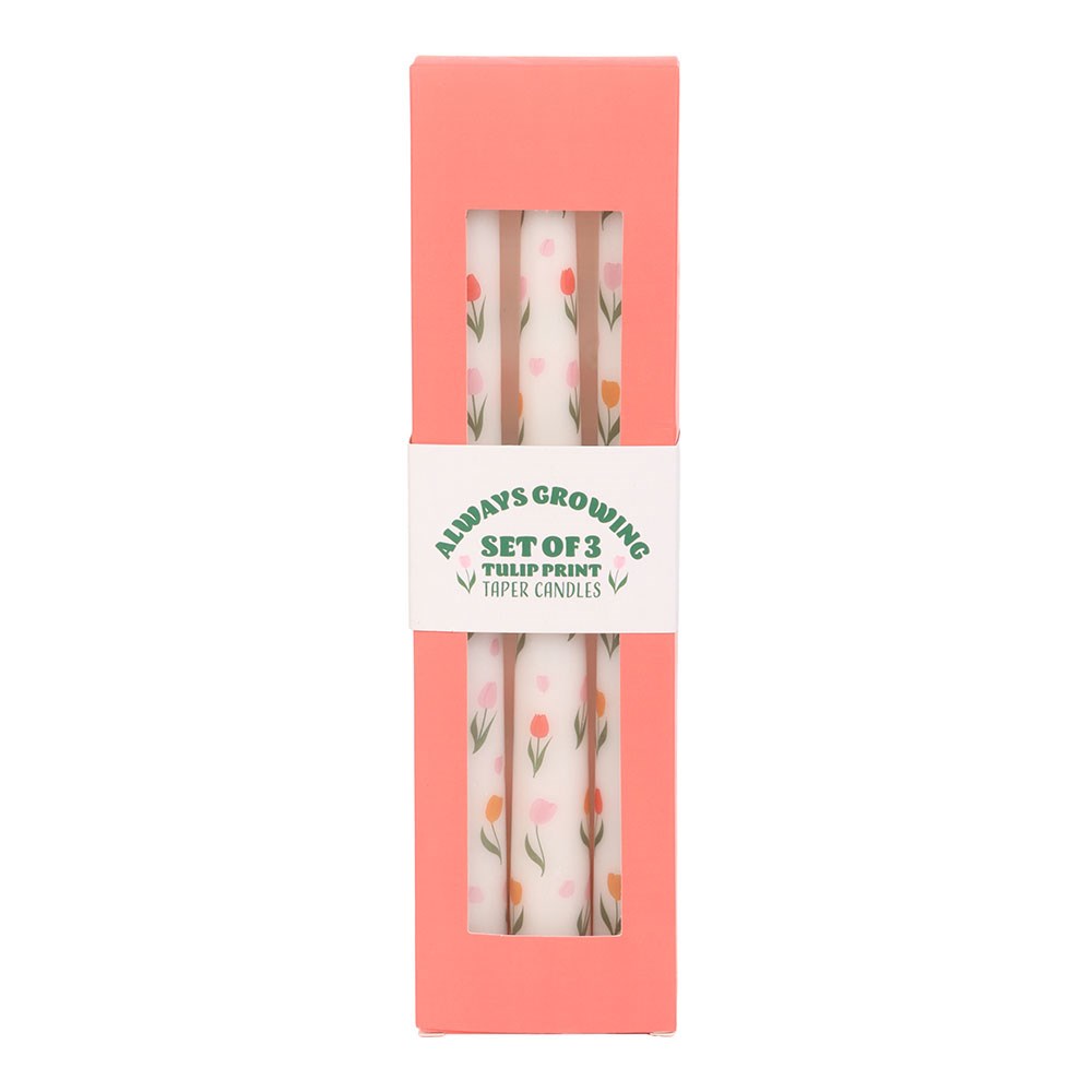 Set of 3 Shabbyquins tulip print taper candles in elegant holders on a decorative table.